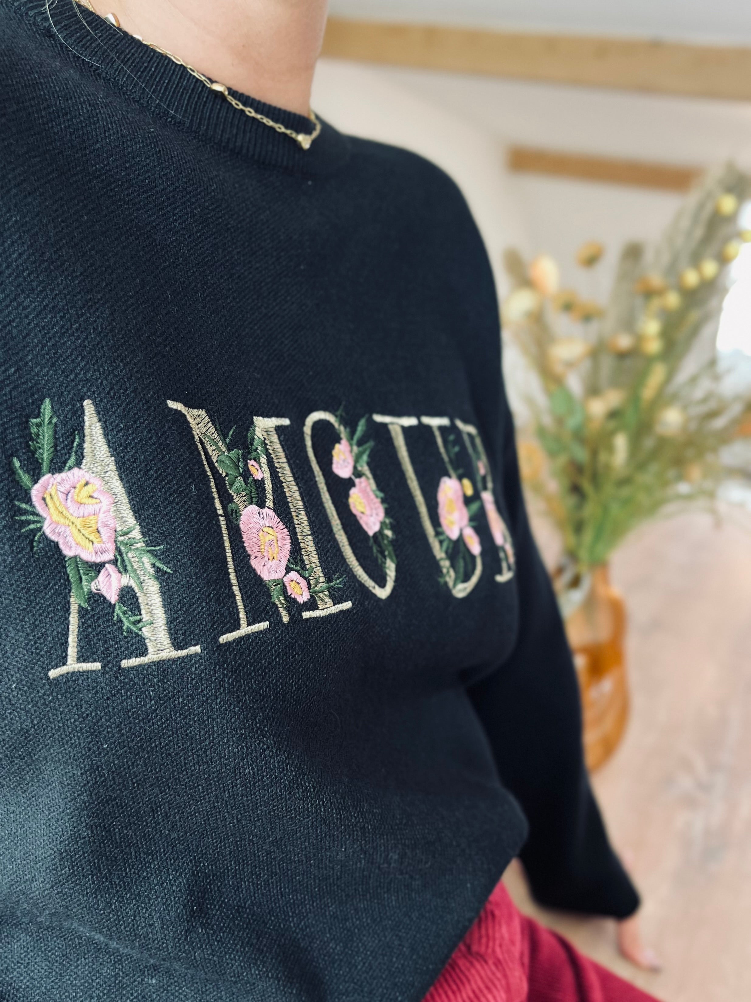 Notre pull « AMOUR » noir